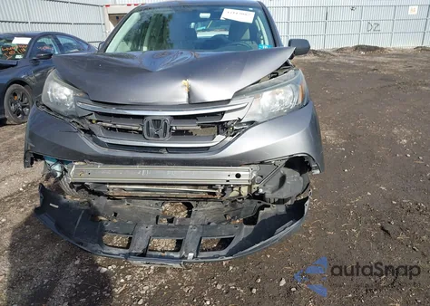 2014 Honda Cr-V Lx z USA, uszkodzony, nr VIN 2HKRM4H32EH614592